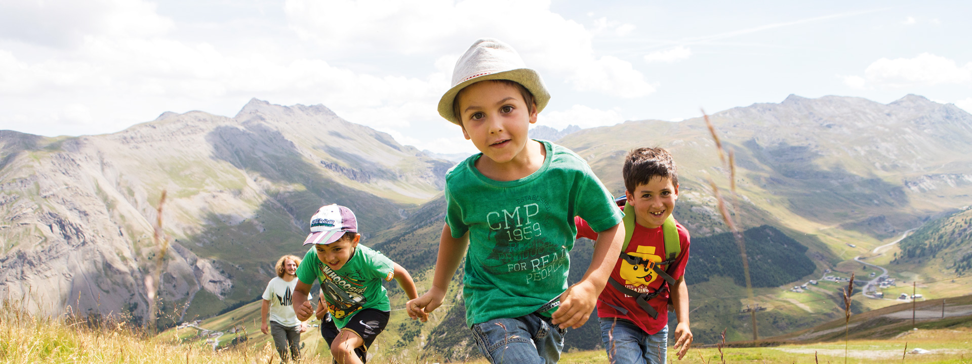 Bambini che si divertono in quota al Mottolino a Livigno