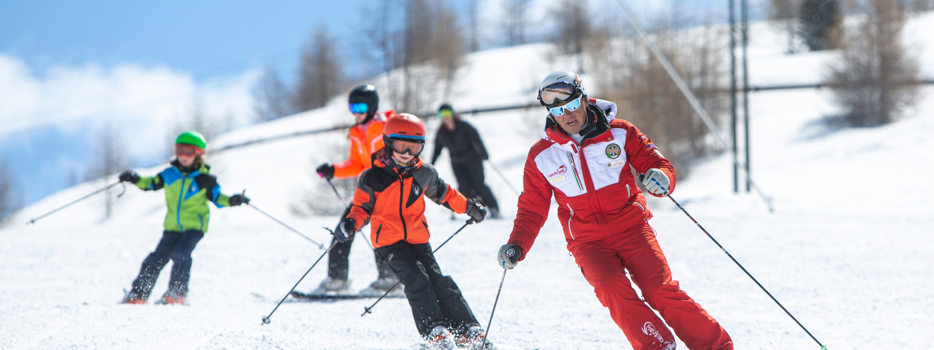 Lezione di sci con maestro della Scuola Sci Centrale di Livigno sulle piste della ski area Mottolino