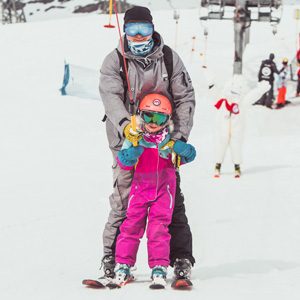 Famiglia sull'impianto Easy Lift del Campo Scuola Mottolino a Livigno